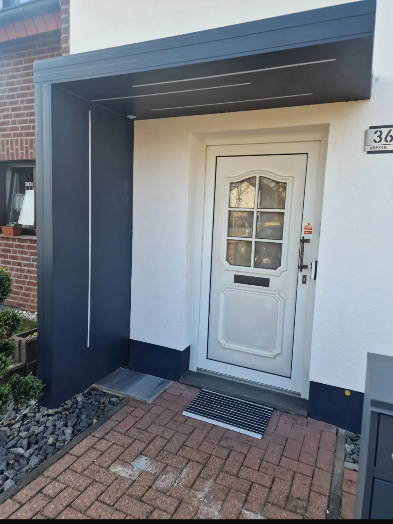 Eingangsüberdachung L-Form