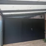 Wintergarten mit Aluwand und Eingangstür aus Aluminium