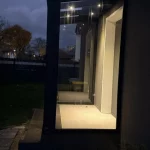 Eingansgüberdachung mit Seitenwand Glas